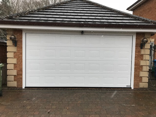 White garage door in the snow