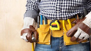 Repair Man with Tool Belt and Gloves